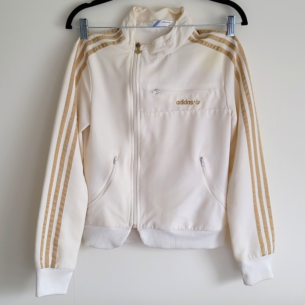 Adidas cream and gold size 34 (xs-s) jacket with 3 zipper pockets
